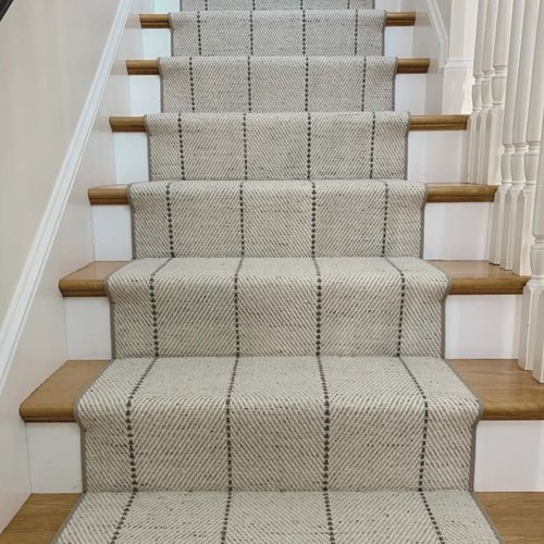 Striped carpet on stairs in a bright Dayton OH home