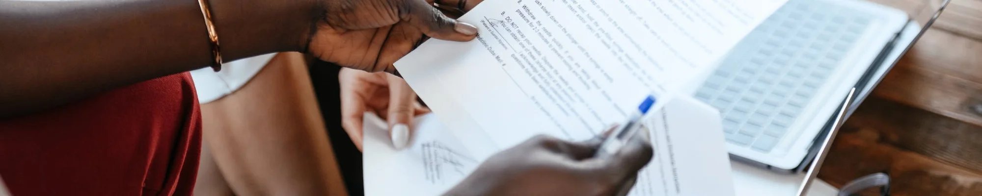 Customer reading a paper contract